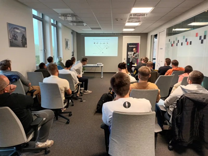 Poznań: AI code reviewer w Dropboxie i twardy hardening Windowsa!